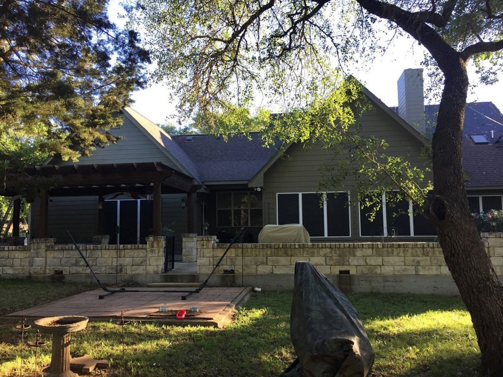 Before: worn three-tab shingle roof with granule loss on a South Austin home