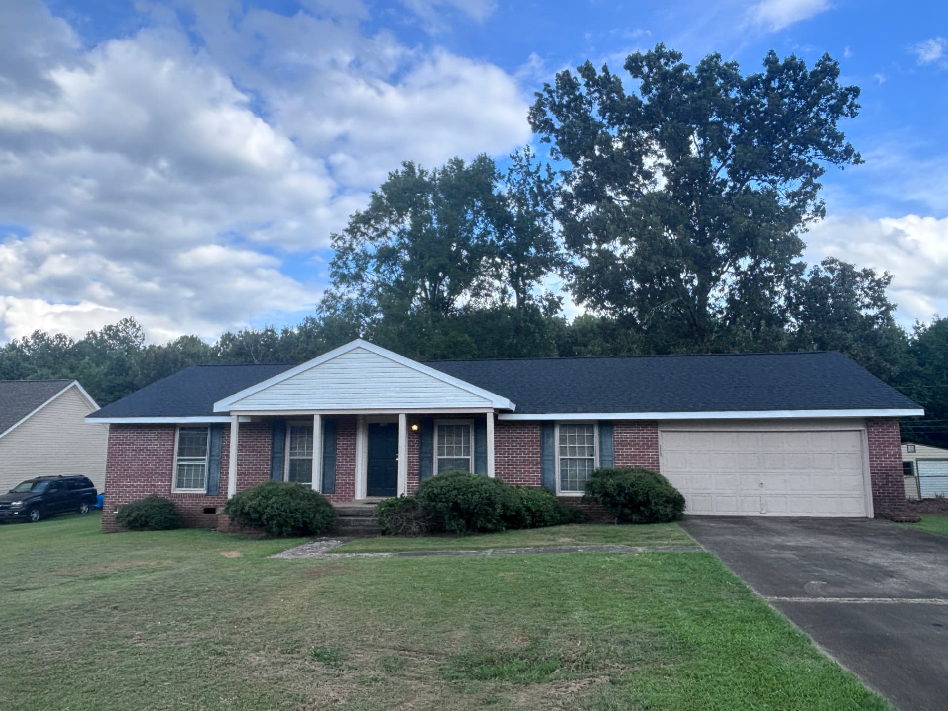 Completed roof replacement on a Buda home in the Garlic Creek neighborhood