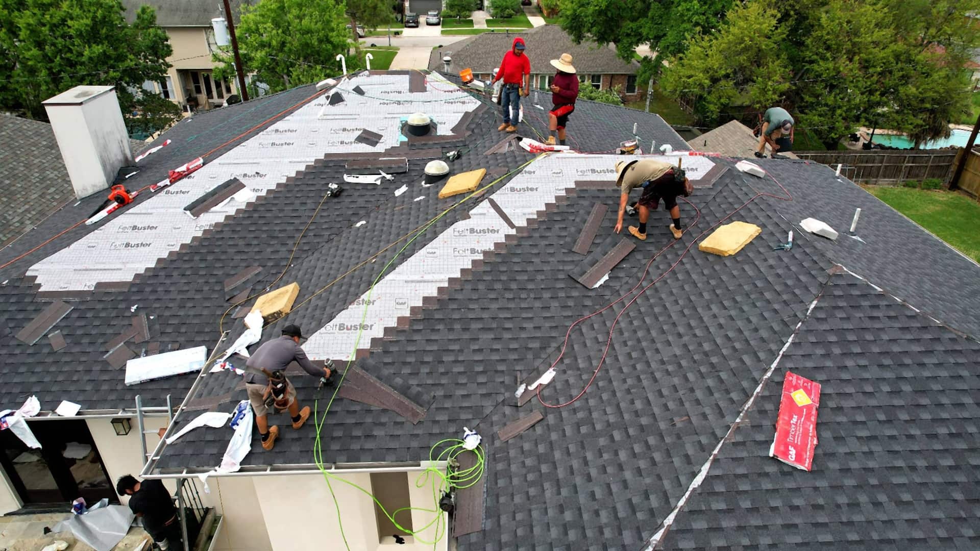 Tex Roof crew installing a new architectural shingle roof on a home in Austin, Texas